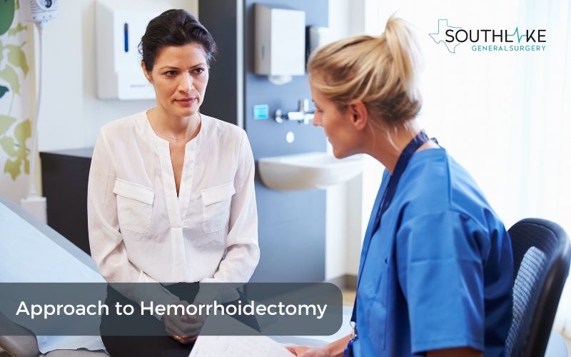 Image of Dr. Valeria Simone, MD, discussing surgical options with a patient, showcasing her expertise and personalized approach to hemorrhoidectomy.